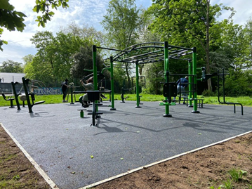 Outdoor gym in park with trees